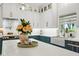 Bright kitchen with quarts countertops and modern fixtures at 1082 Trappers Trail Loop, Davenport, FL 33896