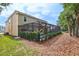 Relaxing screened in pool area perfect for outdoor entertaining and enjoying the backyard space at 1082 Trappers Trail Loop, Davenport, FL 33896