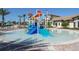Fun splash pad with colorful play structure, perfect for to cool off at 1082 Trappers Trail Loop, Davenport, FL 33896