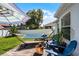 Charming backyard patio with a hammock, fire pit, and comfortable seating for outdoor enjoyment at 1133 Brandy Lake View Cir, Winter Garden, FL 34787