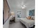 Bright bedroom featuring a cozy bed, window view, and stylish decor for a comfortable retreat at 1133 Brandy Lake View Cir, Winter Garden, FL 34787