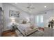 Relaxing bedroom with a plush bed, wood floors, and soft lighting, perfect for a tranquil escape at 1133 Brandy Lake View Cir, Winter Garden, FL 34787