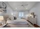 Serene bedroom with a neutral color palette, plush bed, and elegant decor, creating a calming atmosphere at 1133 Brandy Lake View Cir, Winter Garden, FL 34787