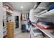 Spacious walk-in closet with ample shelving and hanging space, offering organized storage solutions at 1133 Brandy Lake View Cir, Winter Garden, FL 34787