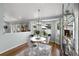 Cozy dining area with modern chandelier, table, and chairs, adjacent to living spaces at 1133 Brandy Lake View Cir, Winter Garden, FL 34787