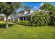 Charming single-Gathering home with lush lawn, mature trees, and covered porch at 1133 Brandy Lake View Cir, Winter Garden, FL 34787