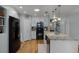 Modern kitchen with stainless steel appliances, granite countertops, and lots of storage at 1133 Brandy Lake View Cir, Winter Garden, FL 34787