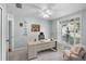 Bright home office with a large window and a comfortable chair at 1133 Brandy Lake View Cir, Winter Garden, FL 34787