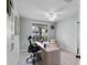Bright home office with a large window and a comfortable office chair at 1133 Brandy Lake View Cir, Winter Garden, FL 34787
