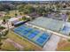 Aerial view of basketball, pickleball, and tennis courts in the community at 12832 Downstream Cir, Orlando, FL 32828