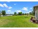 The manicured backyard extends to the lake at 13120 Zori Ln, Windermere, FL 34786