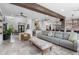 Open-concept living room with tile floors and views of the dining room and kitchen at 13120 Zori Ln, Windermere, FL 34786