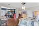 Spacious main bedroom leading into office, walk-in closet and main bathroom. Hardwood floors throughout at 13120 Zori Ln, Windermere, FL 34786