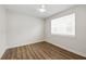 Bedroom featuring a window and wood flooring at 13123 Faro Ct # 23, Winter Garden, FL 34787