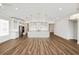 Spacious kitchen and open concept living space with a large center island and modern appliances at 13123 Faro Ct # 23, Winter Garden, FL 34787
