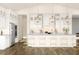 Bright, modern kitchen with stainless steel appliances, white cabinetry, and a spacious island at 13123 Faro Ct # 23, Winter Garden, FL 34787