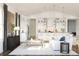 Open-concept living space with a modern kitchen and comfortable seating area at 13123 Faro Ct # 23, Winter Garden, FL 34787