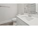 Clean bathroom featuring a modern vanity, toilet, and glass-enclosed shower at 13181 Telsen St # 39, Winter Garden, FL 34787