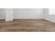 Bedroom with modern wainscoting, laminate flooring, and natural light at 13181 Telsen St # 39, Winter Garden, FL 34787