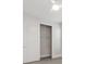 Bedroom closet with sliding doors and an adjustable wire shelf, offering practical storage solutions at 13181 Telsen St # 39, Winter Garden, FL 34787