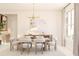 Elegant dining room featuring modern chandelier, neutral tones, and ample natural light from large windows at 13181 Telsen St # 39, Winter Garden, FL 34787