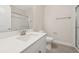Clean, simple bathroom with a quartz countertop, modern fixtures, and a glass-enclosed shower at 13187 Telsen St # 38, Winter Garden, FL 34787