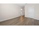 Bedroom boasts laminate flooring, neutral walls and nearby bath access at 13187 Telsen St # 38, Winter Garden, FL 34787