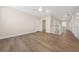 Spacious bonus room showcases laminate flooring, natural light and access to the second floor at 13187 Telsen St # 38, Winter Garden, FL 34787