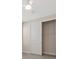 Bedroom closet with double doors and wire shelving at 13187 Telsen St # 38, Winter Garden, FL 34787