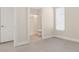 Neutral room with window and attached bathroom with shower and toilet at 13187 Telsen St # 38, Winter Garden, FL 34787