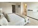 Bedroom view showcasing neutral tones, with easy access to the bath and closet at 14533 Crestavista Ave, Clermont, FL 34714
