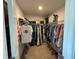 Walk-in closet featuring wire shelving for organization and ample storage space at 14533 Crestavista Ave, Clermont, FL 34714