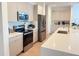 Well-equipped kitchen features stainless appliances, stone countertops and ample cabinet space at 14533 Crestavista Ave, Clermont, FL 34714