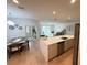 Spacious kitchen with a large island, modern appliances, and an open layout to the living room at 14533 Crestavista Ave, Clermont, FL 34714