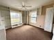 A bedroom with built-in shelving around two windows at 1931 N Portillo Dr, Deltona, FL 32738