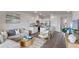 Open-concept living space featuring a contemporary kitchen with island and inviting living room layout at 2064 Monteverde Ave, Davenport, FL 33837