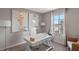 Bright home office with a large window, stylish decor, and comfortable workspace at 2068 Monteverde Ave, Davenport, FL 33837