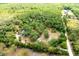 Aerial view of the wooded lot with greenery and trees at 2320 Red Ember Rd, Oviedo, FL 32765