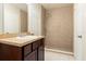 Bathroom featuring a vanity with ample counter space and a tiled walk-in shower at 2320 Red Ember Rd, Oviedo, FL 32765
