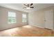 Bedroom with ceiling fan and dual windows providing natural light, ready for personal touches at 2320 Red Ember Rd, Oviedo, FL 32765