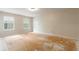 Empty bedroom with two windows and bare wood flooring at 2320 Red Ember Rd, Oviedo, FL 32765