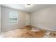 Spacious bedroom with ample natural light from the window, ready for customization and personalization at 2320 Red Ember Rd, Oviedo, FL 32765