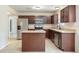 Modern kitchen with stainless steel appliances, ample counter space, and stylish cabinetry at 2320 Red Ember Rd, Oviedo, FL 32765