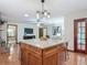 Open concept kitchen with an island and view of the living areas at 2350 Worthington Rd, Maitland, FL 32751