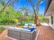 Inviting outdoor brick patio with comfortable seating, perfect for relaxing and entertaining near the pool at 2350 Worthington Rd, Maitland, FL 32751