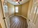 Bedroom with hardwood floors and a ceiling fan at 30732 Lipizzan Ter, Mount Dora, FL 32757