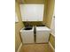 Bright laundry room including a washer and dryer at 30732 Lipizzan Ter, Mount Dora, FL 32757