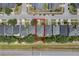 An aerial view highlighting the property and its location within a well-maintained community at 3436 Gerber Daisy Ln, Oviedo, FL 32766
