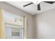 Neutral bedroom featuring a ceiling fan, a window, and neutral-colored walls at 3436 Gerber Daisy Ln, Oviedo, FL 32766