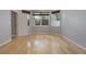 Bright bedroom with hardwood floors and natural light from windows at 3436 Gerber Daisy Ln, Oviedo, FL 32766